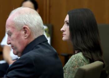 Defense attorney Kevin Reddington, left, and his client, Lindsay Clancy right, listen to testimony during Clancy's murder trial at Plymouth Superior Court in Plymouth, Mass., Wednesday, Aug. 12, 2026. (Mark Stockwell/Boston Herald via AP, Pool)
