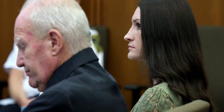 Defense attorney Kevin Reddington, left, and his client, Lindsay Clancy right, listen to testimony during Clancy's murder trial at Plymouth Superior Court in Plymouth, Mass., Wednesday, Aug. 12, 2026. (Mark Stockwell/Boston Herald via AP, Pool)